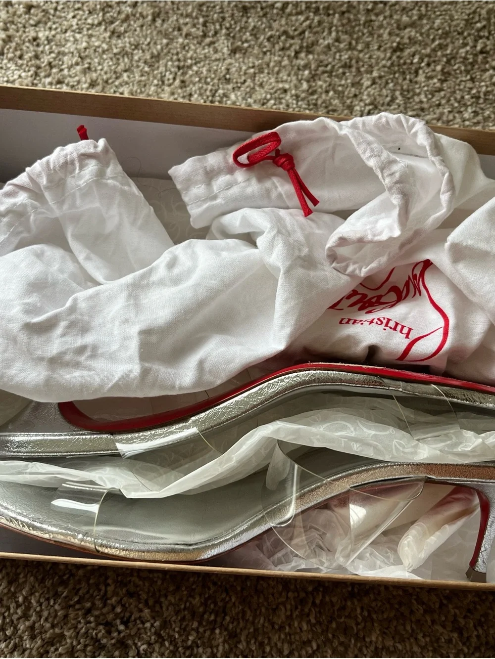 Authentic Christian Louboutin Silver Clear sandal heel